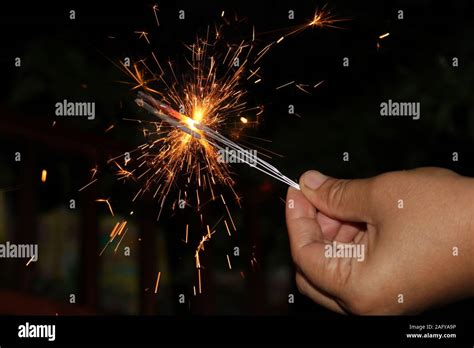 Small Fireworks Are Lit At The New Years Event Stock Photo Alamy