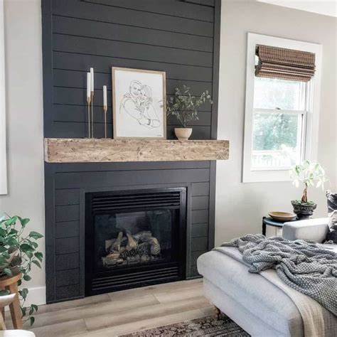 Black Shiplap Fireplace With Portrait Art Piece Soul And Lane