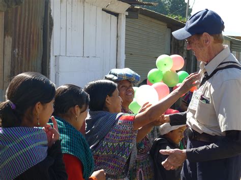 CFCA families greeting Bob Hentzen, founder, at Hoya Grande, Guatemala