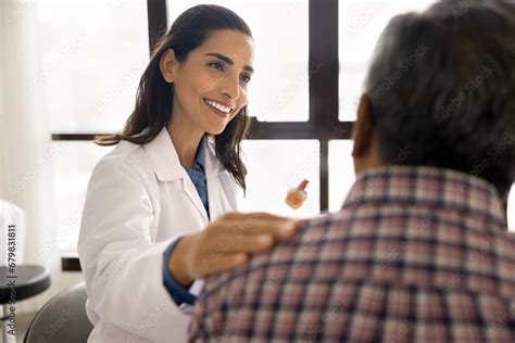 Positive Beautiful Geriatric Medical Therapist Woman Seeing Older Grey