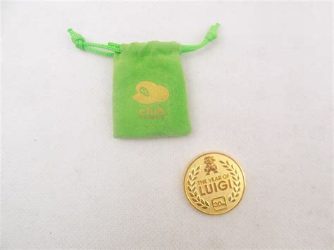 Like New Club Nintendo Year Of Luigi Challenge Coin with Drawstring ...