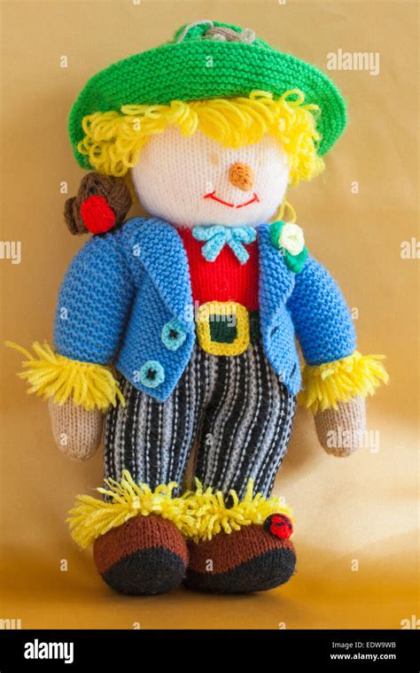 Knitted Doll Knitted Toy Wurzel Gummidge Scarecrow Isolated On Gold