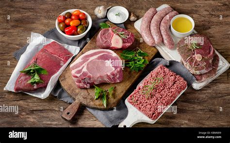 types  fresh raw meat   rustic wooden background top