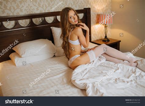 Beautiful Naked Girl Sitting On Bed Stock Photo Edit Now
