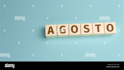 spanish word agosto august built  letters  wooden cubes
