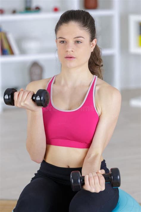 Young Lady Weight Lifting At Home Stock Photo Image Of Wellness Home