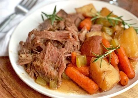 The Best Easy Slow Cooker Pot Roast Made With Ranch Brown Gravy