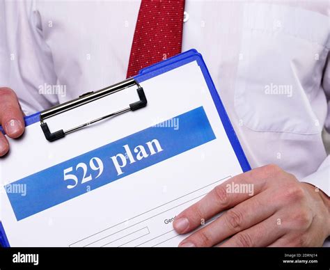 Manager Offers To Sign The 529 Plan Application Stock Photo Alamy