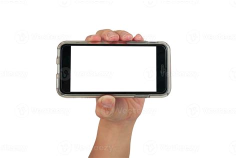 Female hand holding horizontal smart phone, use clipping path 27302666