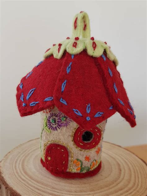 Tooth Fairy House With A Dark Red Roof Felt