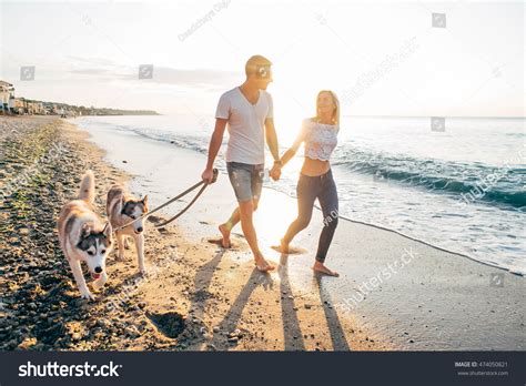 4,973 Couple Walking Dog On Beach Images, Stock Photos & Vectors | Shutterstock