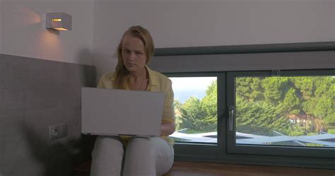 Blonde Woman Working On Laptop 29156956 Stock Video At Vecteezy