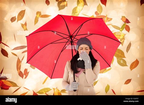 Composite Image Of Sick Brunette Blowing Her Nose While Holding An