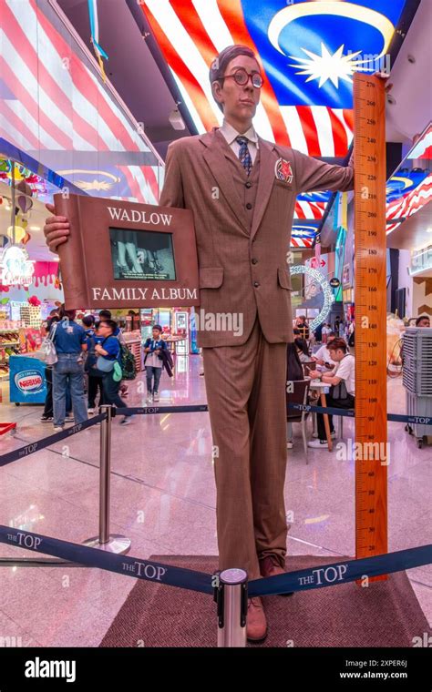 A life sized model of the Worlds Tallest man at The Top, Komtar Tower