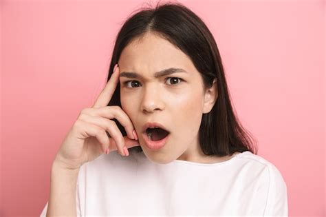 Premium Photo Portrait Closeup Of Brunette Excited Girl In Casual Wear Looking At Front With