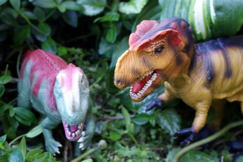 Dinosaurs in fight. | Stock image | Colourbox