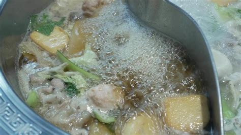View Of Boiling Hot Pot Tasty With Spicy Soup Shabu Shabu In Chinese Style With Vetgetable In