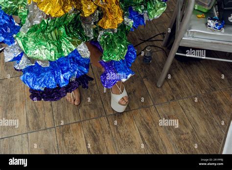 View Of High Heeled Shoes Of Drag Queen Finishing Dressing To Go To Gay Pride March Stock Photo