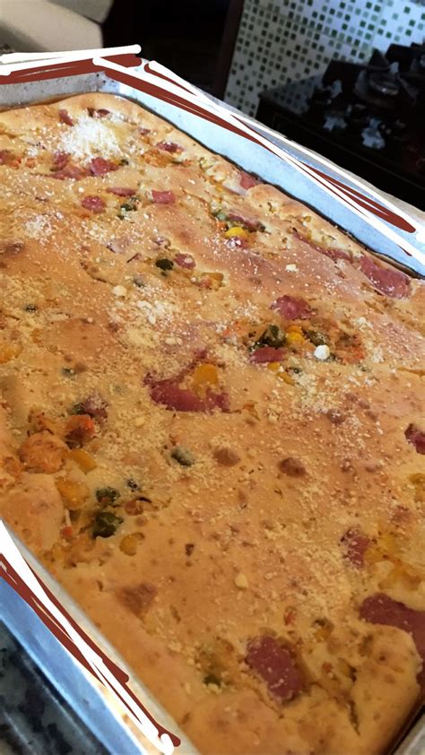 A Pan Filled With Food Sitting On Top Of A Counter