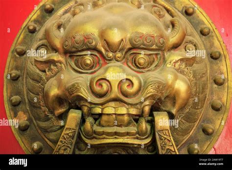 Ancient Chinese architecture copper door knocker Stock Photo - Alamy