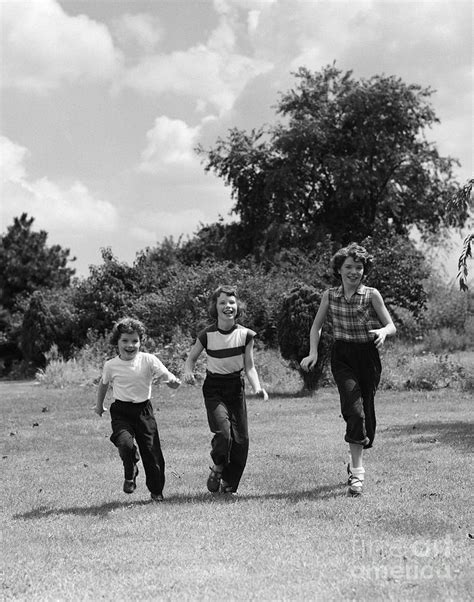 Three Girls Running In A Field C1950s Photograph By H Armstrong Robertsclassicstock Pixels