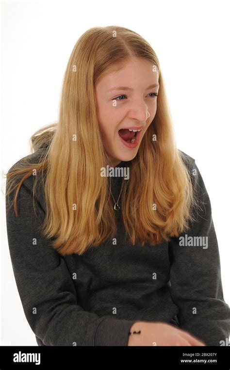 Pretty Blonde Teenage Girl Yawning Isolated On White Background Stock