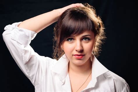 Premium Photo Brunette Girl In White Shirt Posing
