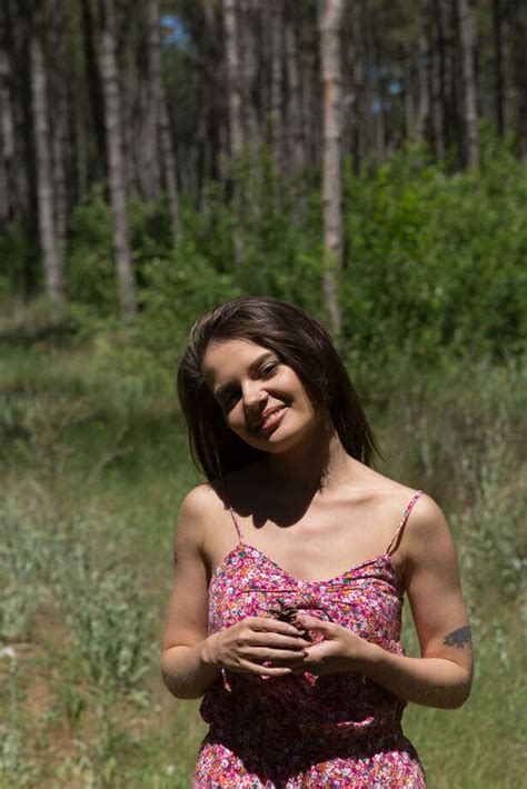 P Nice Teen Pola Holds A Pine Cone While Modeling Totally Naked In