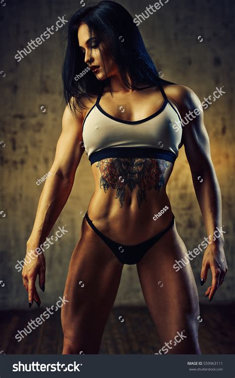 Sexy Strong Brunette Fitness Woman Posing Stock Photo Edit Now 559963111