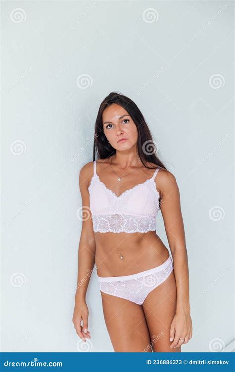 Beautiful Woman In Pink Lingerie In A White Room Stock Image Image Of Attractive Desire