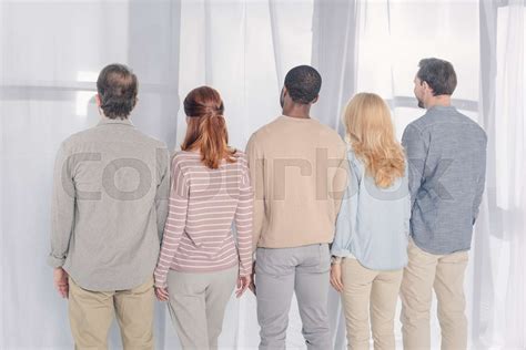 Multiethnic People Standing Together Stock Image Colourbox