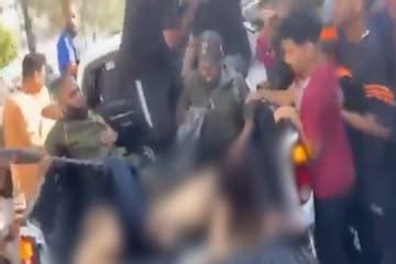 Israel Hamas war Woman paraded naked by militants identified as German tattoo artist ಜರಮನ