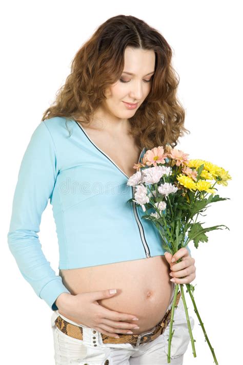 Brunette Embarazado De La Belleza Con La Flor Imagen De Archivo Imagen De Alegre Vientre