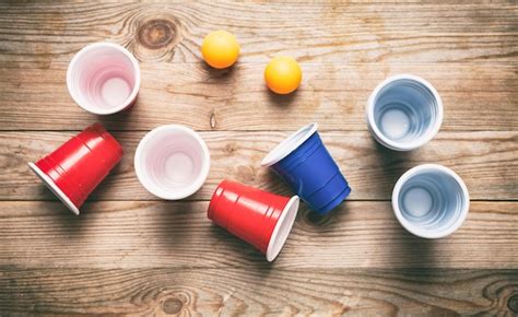 Premium Photo Beer Pong Plastic Red And Blue Color Cups And Ping Pong