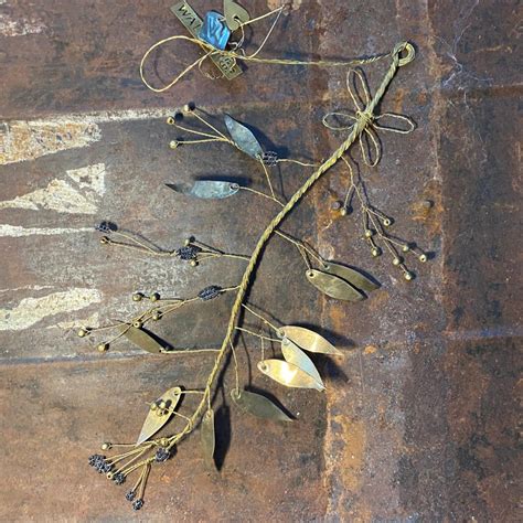 Brass Branch With Silver Leaves Black Berries And Brass Berries Bot