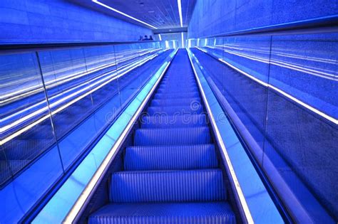 Escalator In Gammel Strand Metro Station Illuminated In Blue Editorial