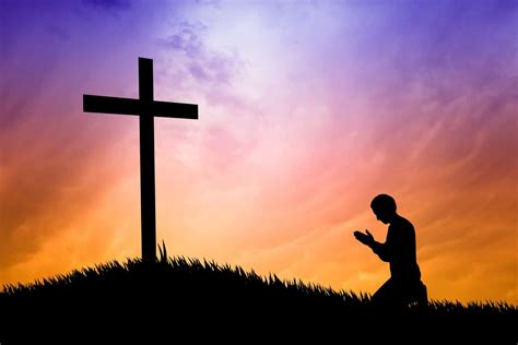 illustration of a man praying under the cross | Divine Creative Love