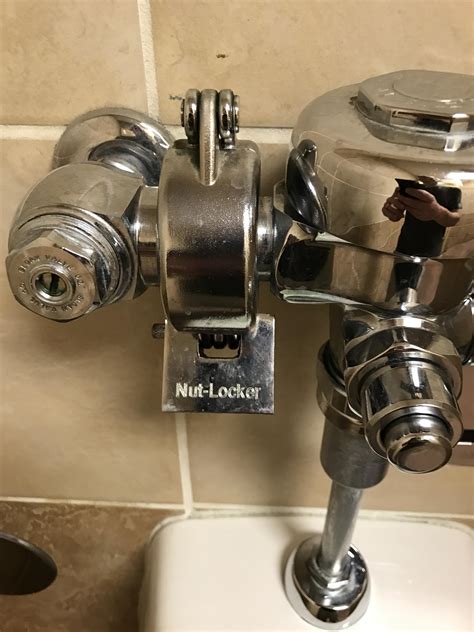 "Nut-Locker" found on a gas station urinal in Texas. What? : r