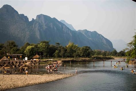 Vang Vieng Trekking To Hmong Village And Blue Lagoon Swimming Day Tour