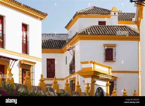 Seville in Spain. Traditional colors of the city, white and yellow ...