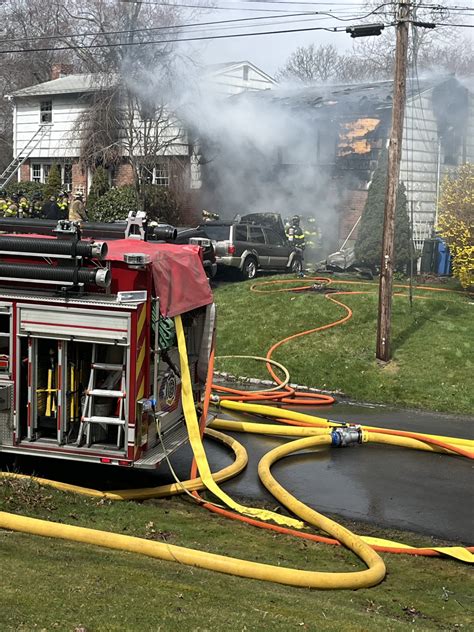 Garage fire spreads to house in Clinton