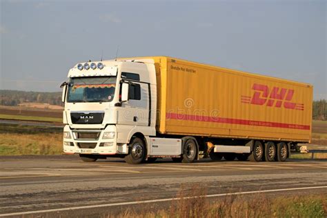 White MAN TGX 18.480 Truck Hauls DHL Trailer Editorial Image - Image of ...