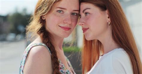 Premium Photo Portrait Of Two Lesbian Woman Standing In The City Centre Woman Feeling In Love