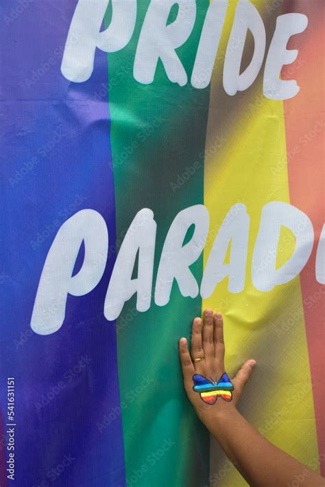 Rainbow Gay Pride Flag Freedom Flag And Human Hand With Rainbow Gay Pride Tattoo Design On