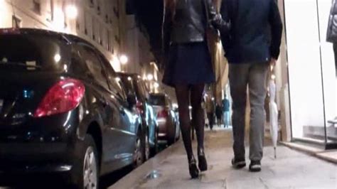 Brunette In Mini Skirt Pantyhose And High Heels