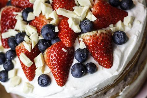 A Detail Of A Home Made Naked Cake With Cream Strawberries Stock Photo Image Of Strawberries