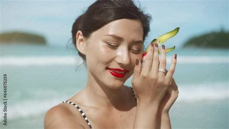 Beautiful Pretty Asian Woman In Pinup Bikini Holding Dragon Fruit On Tropical Paradise Beach