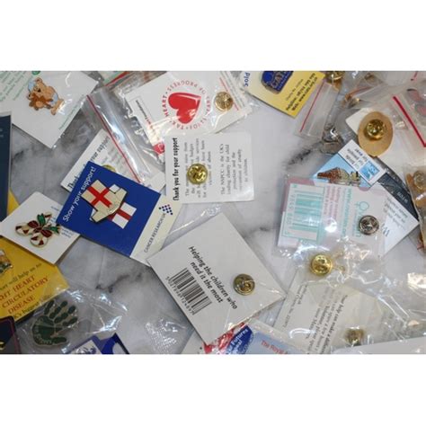 A Quantity Of Collectable Pin Badges And Other