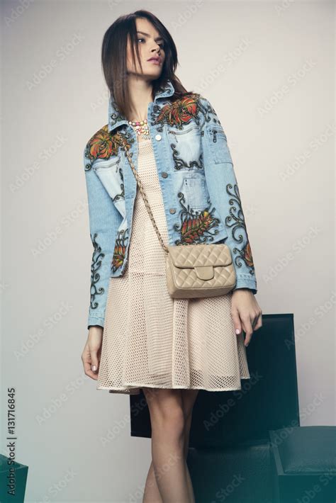 Beautiful Brunette Posing In Studio Stock Photo Adobe Stock