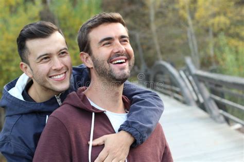 Gay Couple Enjoying The Park In Autumn Stock Image Image Of Lifestyle Leaf 111772221